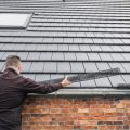 Handyman Installing Gutter Guards